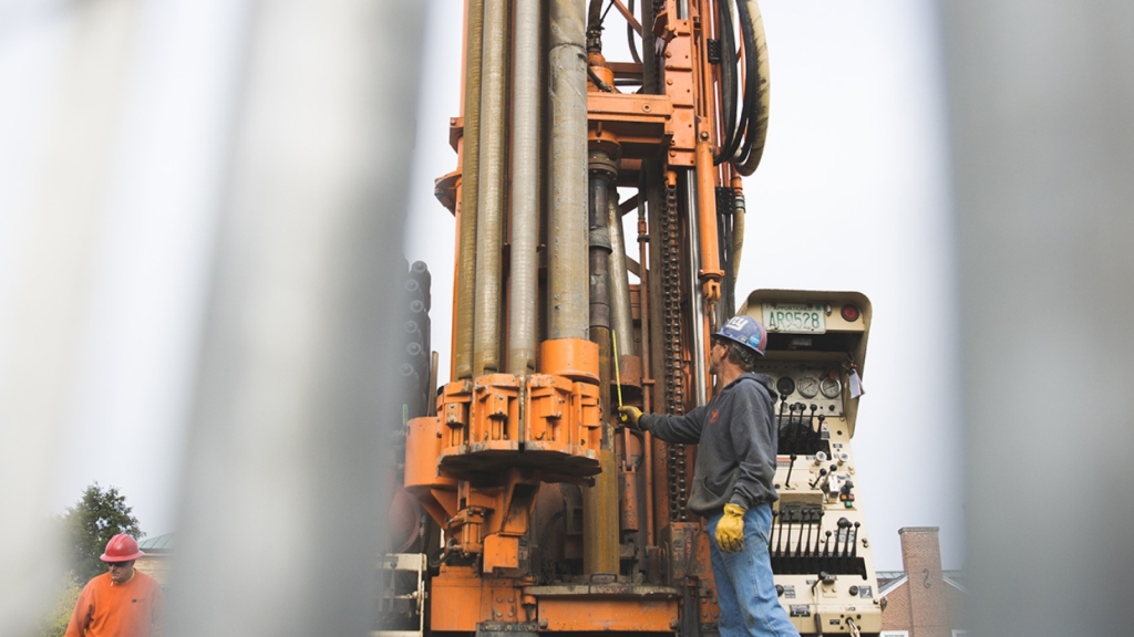 Men working with heavy equipment 